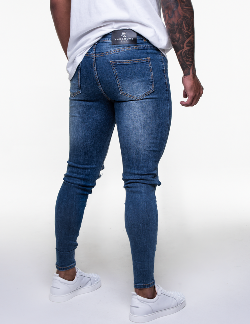 ROYAL BLUE ULTRA RIPPED JEANS